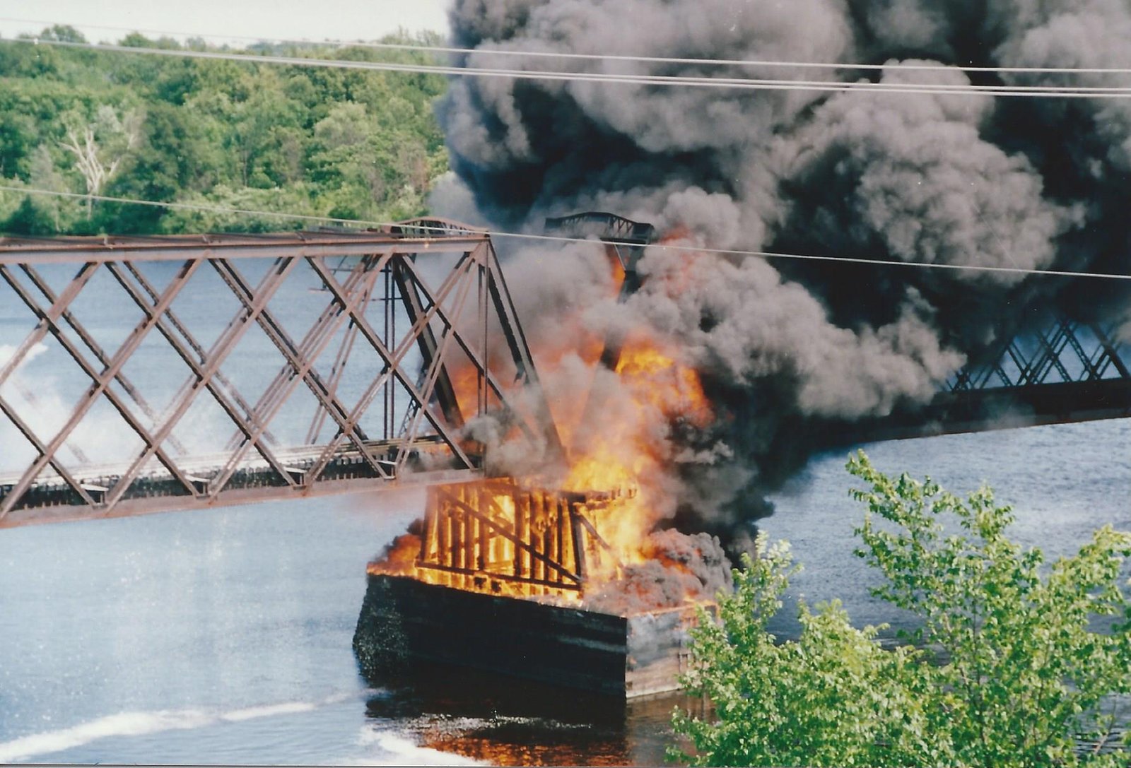 Burning pier.  Tom Larson photo